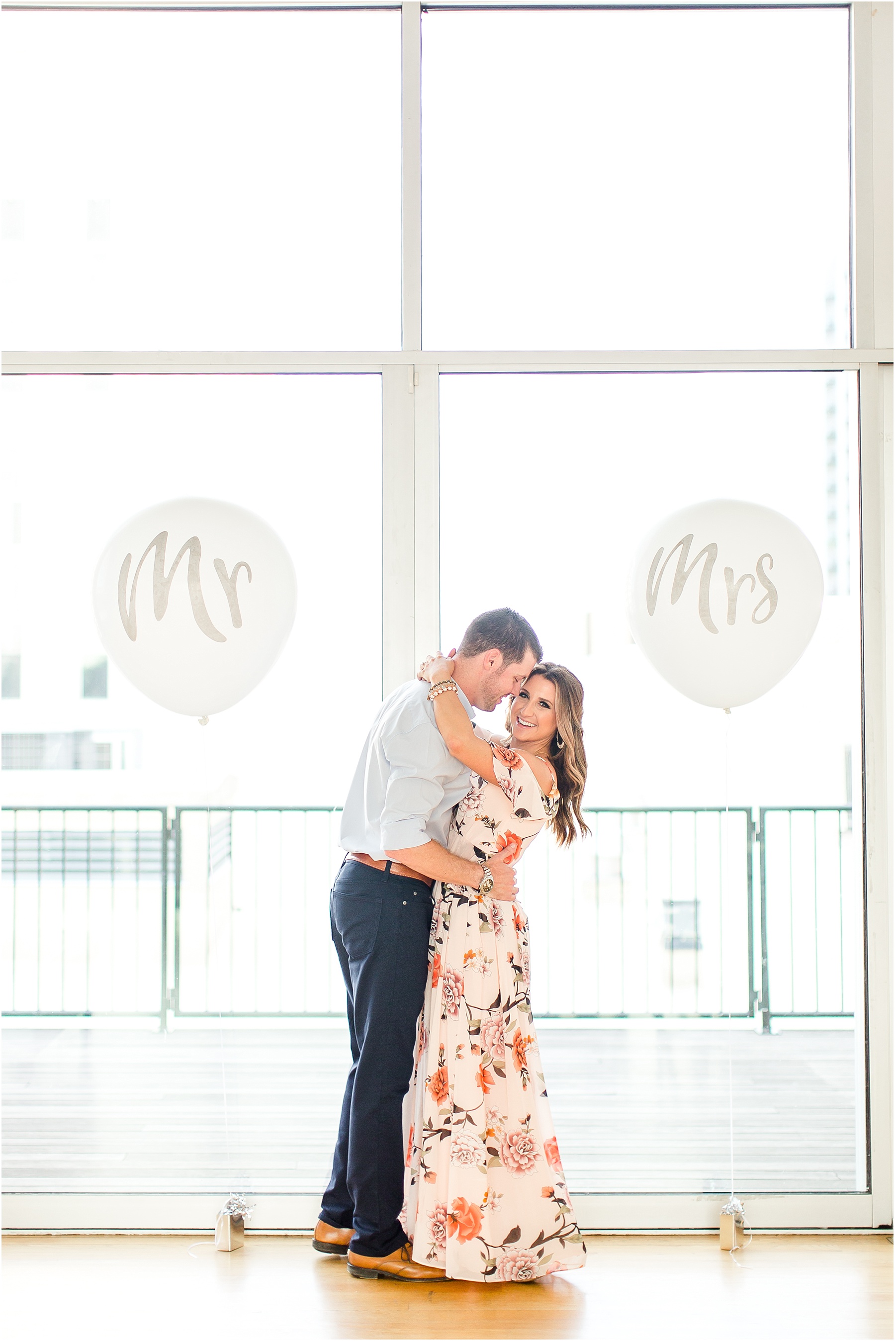 downtown raleigh glass box engagement session