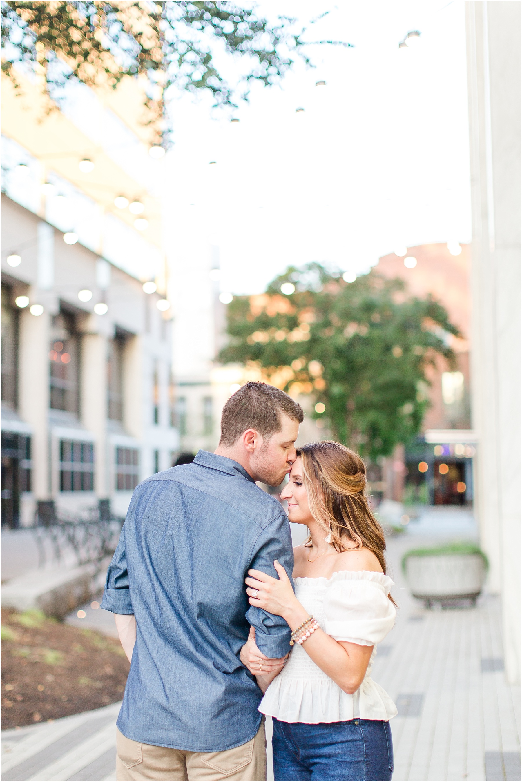 downtown raleigh glass box engagement session